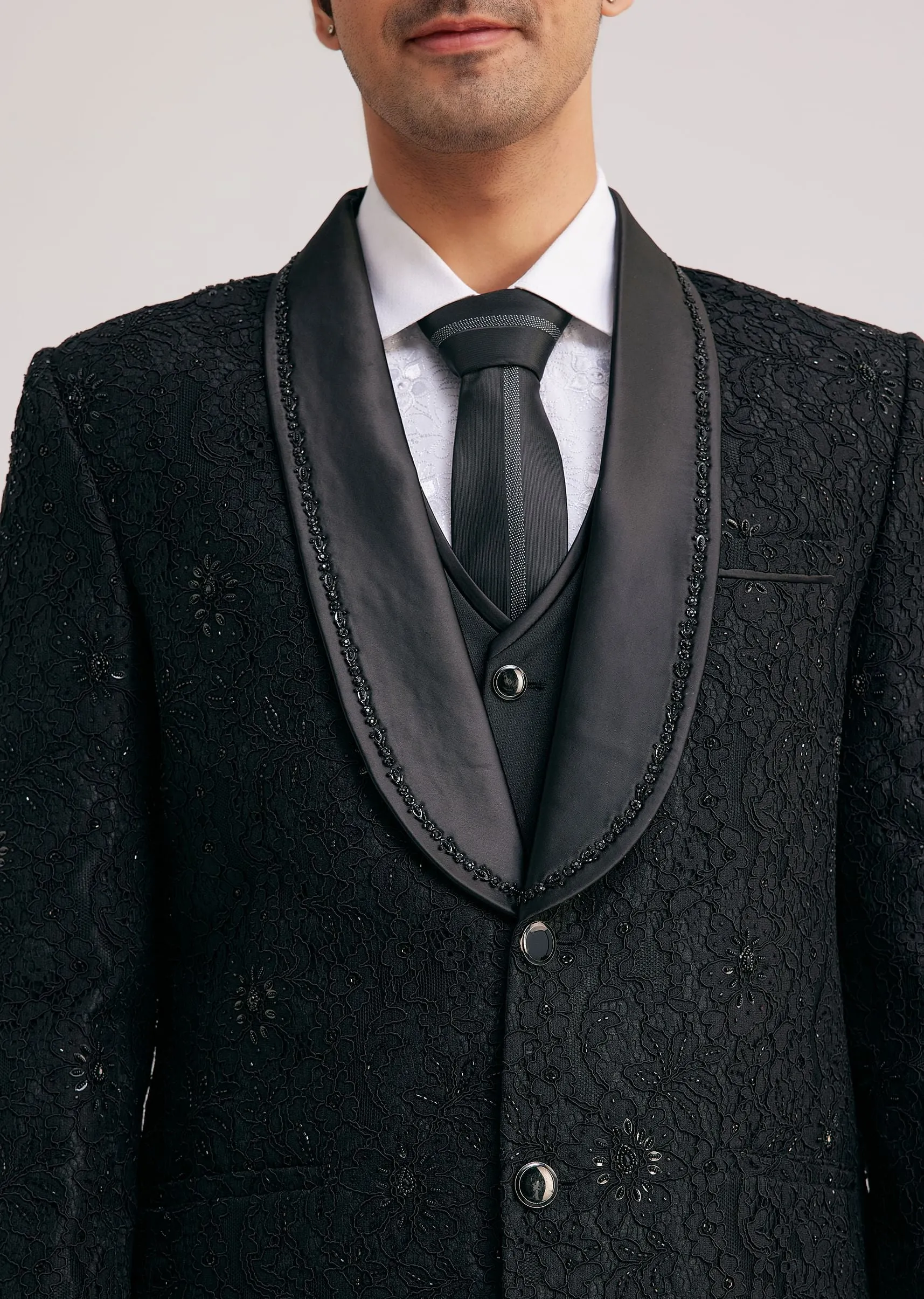 Black Silk Tuxedo With Stone Work And Net Detailing